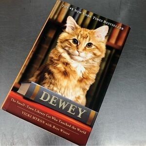 Dewey: The Small Town Library Cat Who Touched the World by: Vicki Myron hardback